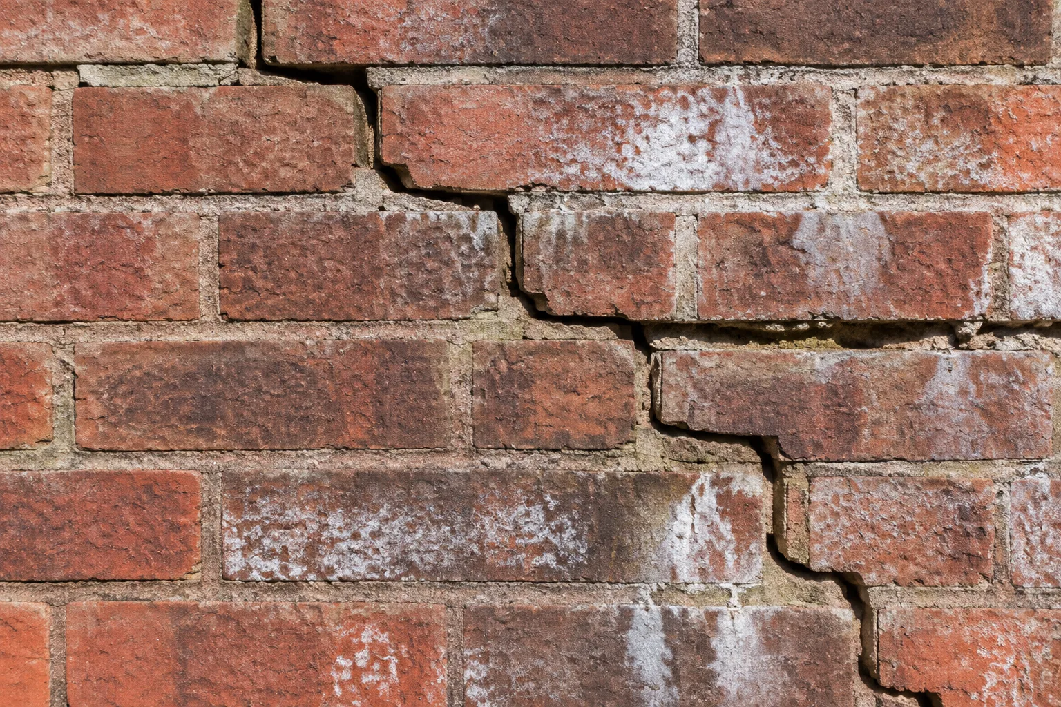 Masonry cracks, weathering and wall movement